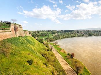 Scenic view of landscape against cloudy sky