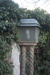 Close-up of birdhouse on tree