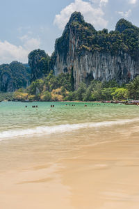 View of beach against cloudy sky