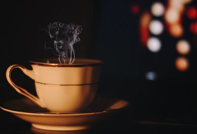 Close-up of coffee cup on table