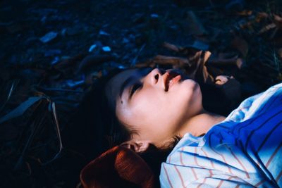 High angle view of woman lying down