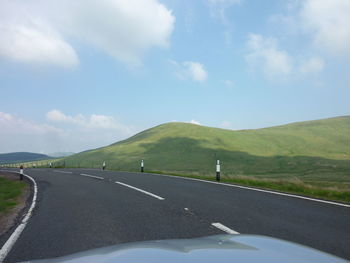 Country road passing through landscape