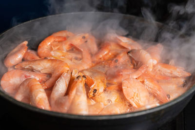 Close-up of fish in cooking pan