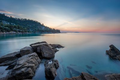 Scenic view of sea against sky during sunset