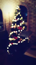 Defocused image of illuminated christmas tree