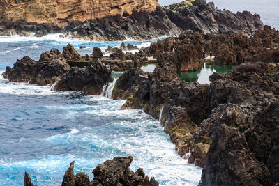 Scenic view of rocks in sea