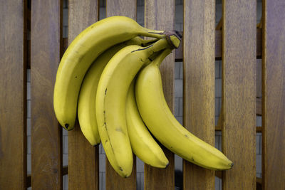 Close-up of bananas on wooden wall