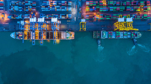 High angle view of container ship at commercial dock