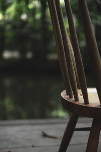 Close-up of bench in park