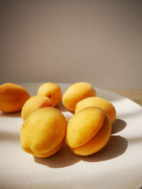 Close-up of orange fruits on table