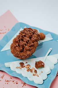 High angle view of chocolate cake in plate on table