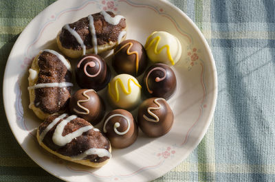 Directly above shot of chocolate desserts on plate