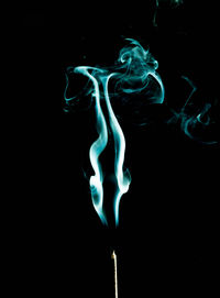 Close-up of smoke against black background