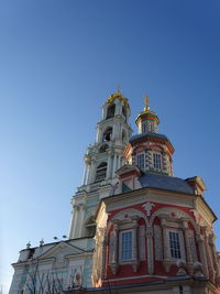 Low angle view of building against blue sky