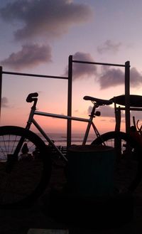 Silhouette of bicycle at sunset