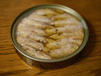 Close-up of fish in container on table