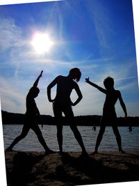 Silhouette of woman against sky