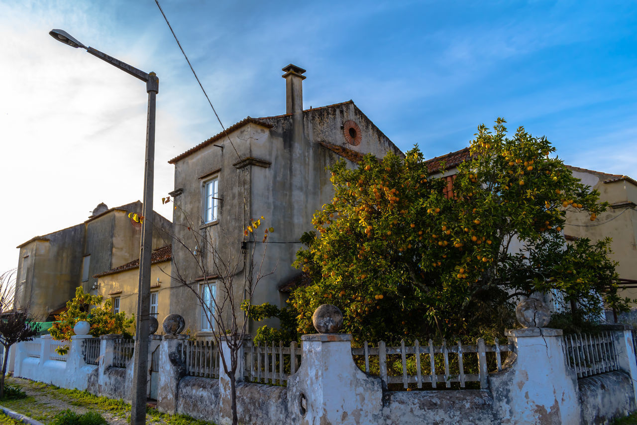 DAMAGED BUILDING AGAINST SKY