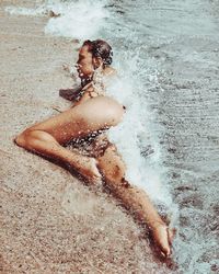 Woman relaxing in water