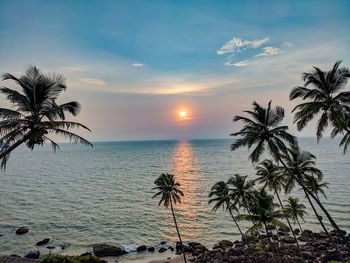 Scenic view of sea against sky at sunset