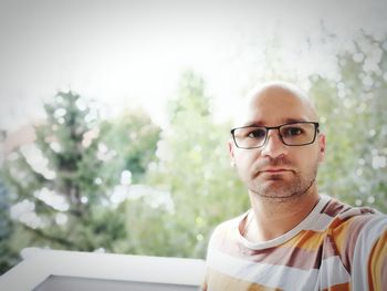 Portrait of young man wearing eyeglasses