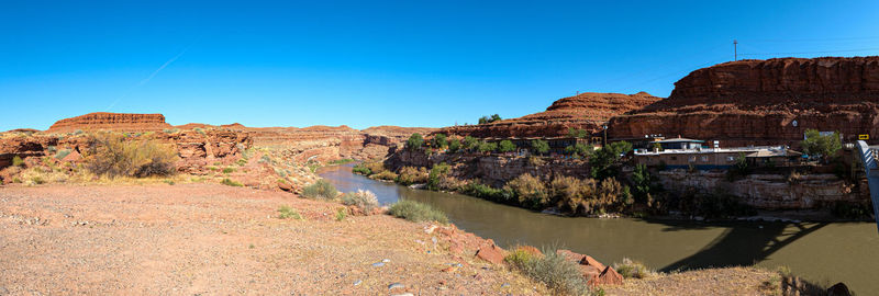 View of rock formations against blue sky