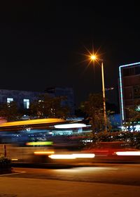 Light trails on city street at night