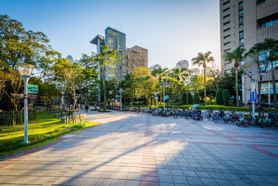 Street amidst buildings against sky