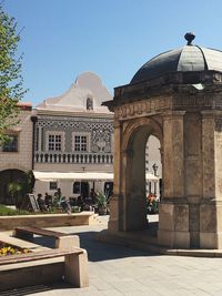 Exterior of historic building against clear sky