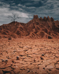 Rock formations in desert against sky