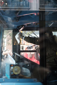 Man working on glass window