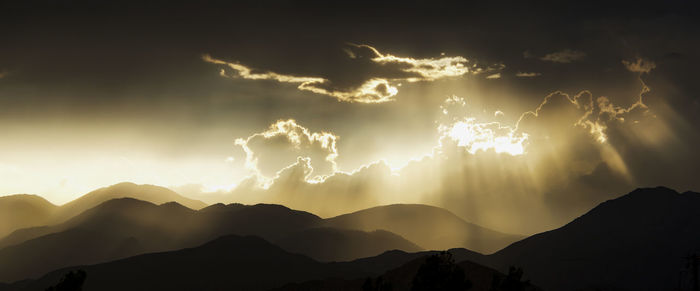 Scenic view of mountains against sky during sunset