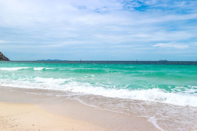 Scenic view of beach against sky