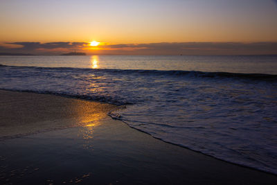 Scenic view of sea against sky during sunset