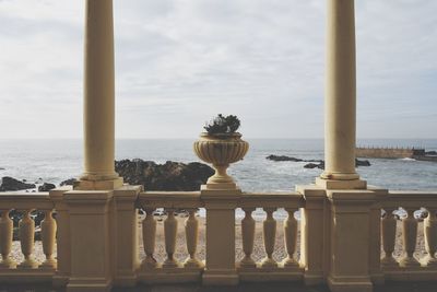 Close-up of railing against sea