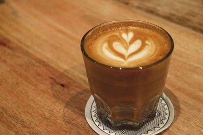 High angle view of cappuccino on table