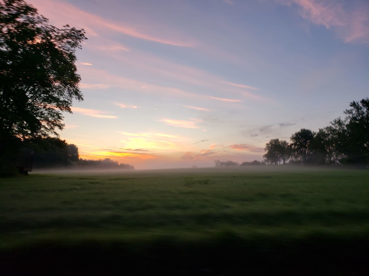 SCENIC VIEW OF LANDSCAPE AGAINST SKY DURING SUNSET