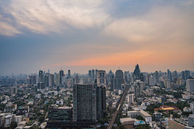 View of cityscape against sky during sunset