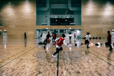 Woman standing by railing