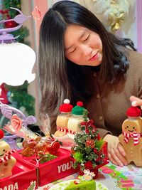 Portrait of young woman with christmas decoration