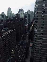 High angle view of street amidst buildings in city