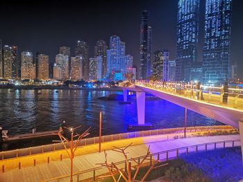 Illuminated buildings in city at night