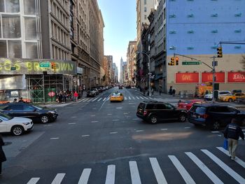 Cars on street in city