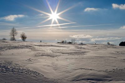 Scenic view of beach against sky during sunset