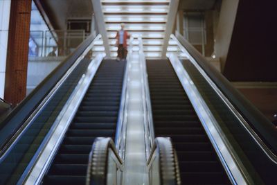 Low angle view of escalator in building