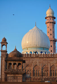 View of historic building against clear blue sky