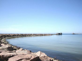 Scenic view of sea against clear sky