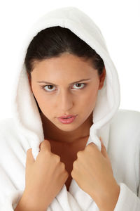Portrait of a beautiful young woman over white background