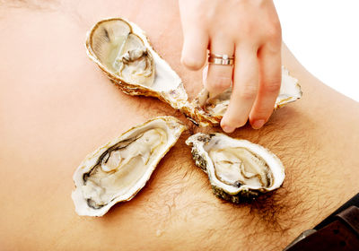 Midsection of woman holding ice cream