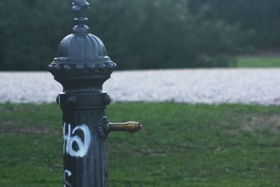 Close-up of fire hydrant on field